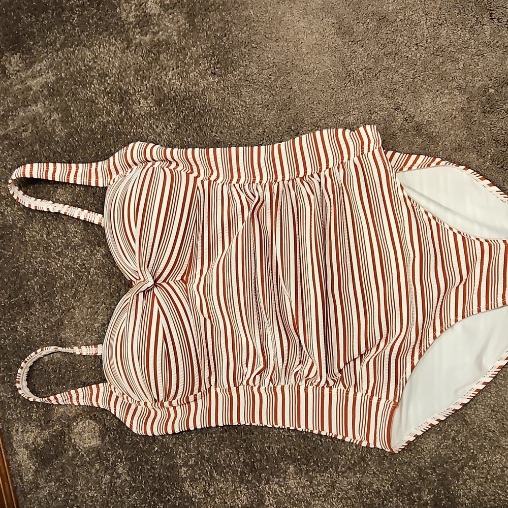 Nip tuck striped twist front one piece swim suit size US 10 with tummy control